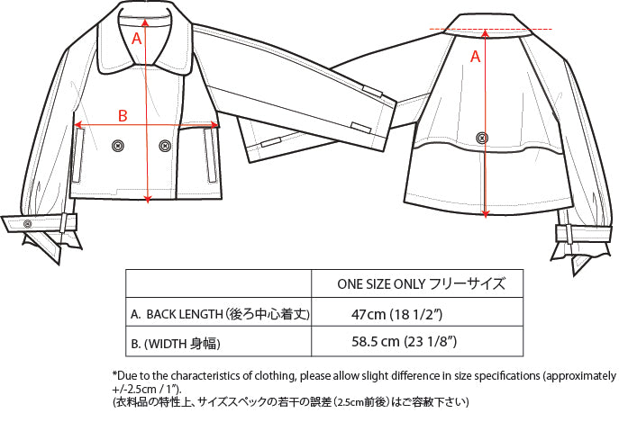 A person with short blond hair wearing oversized black sunglasses, a Marie Cropped Glen Plaid Jacket by Maison Lilli in a soft wool blend with an adjustable back waist, a beige shirt, and a gold chain necklace stands against a neutral gray background. The individual exudes a confident and stylish demeanor.